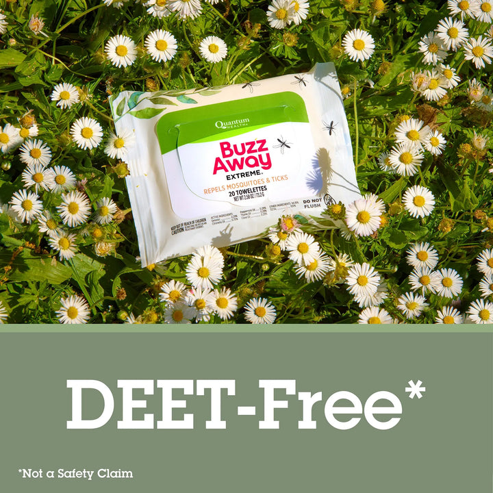 Buzz Away DEET-Free insect repellent packets on grass with daisies, labeled as 'Not a Safety Claim'.