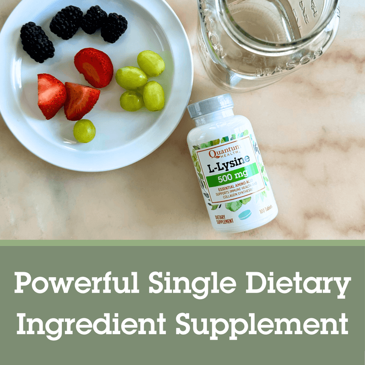 Supplement bottle labeled 'L-Lysine' with a plate of fruits and a glass of water on a marble surface.