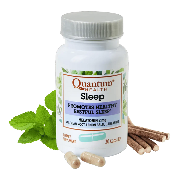 Quantum Health Sleep supplement bottle with capsules and herbs on a white background
